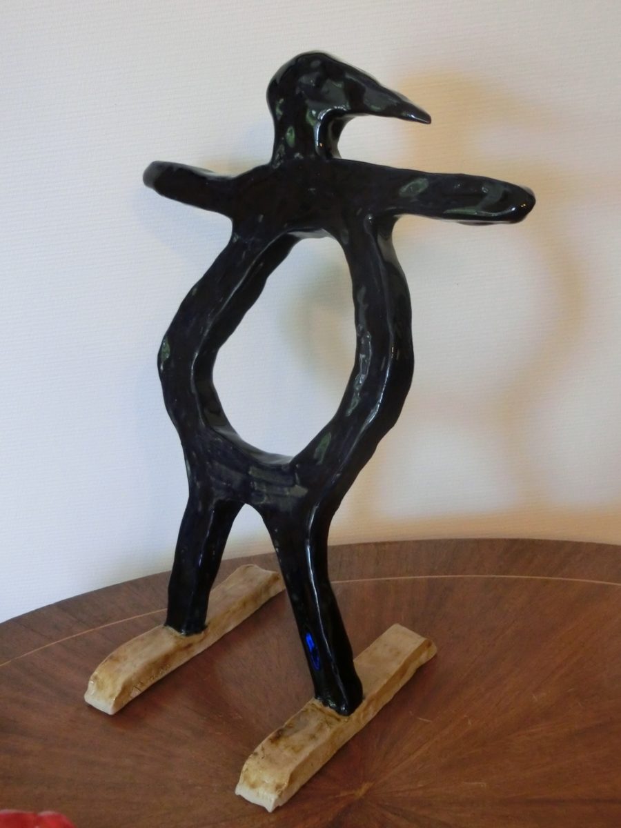 Homme oiseau penché